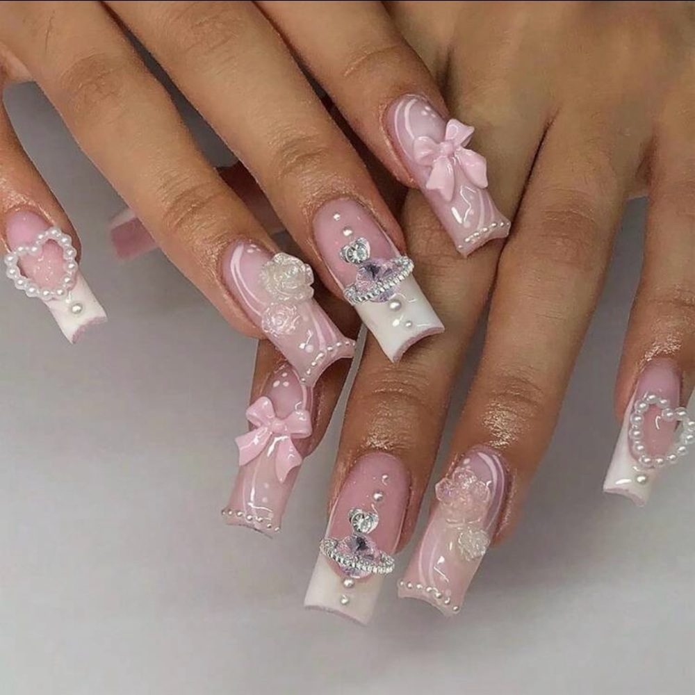 Elegant Pink and White Nail Art with Bows